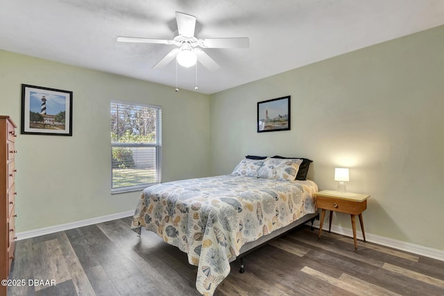 bedroom featuring ceiling fan and dark hardwood / wood-style flooring