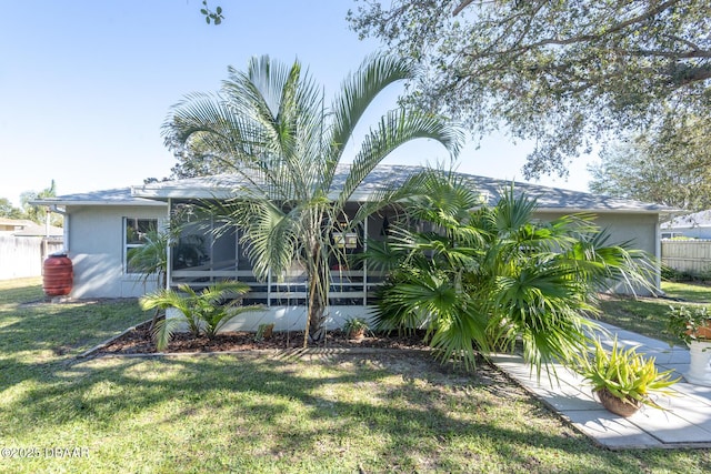 view of yard featuring a sunroom