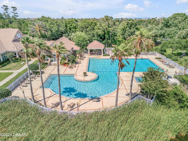 view of pool featuring a patio and a gazebo