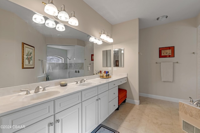 bathroom featuring walk in shower, vanity, and tile patterned flooring