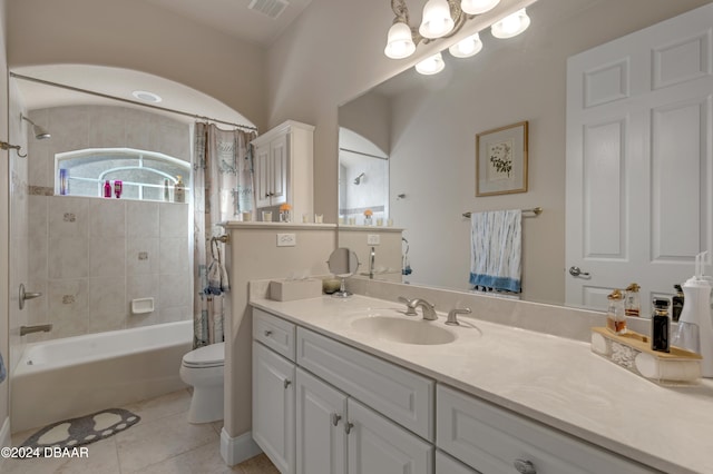 full bathroom with tile patterned flooring, vanity, toilet, and shower / tub combo with curtain