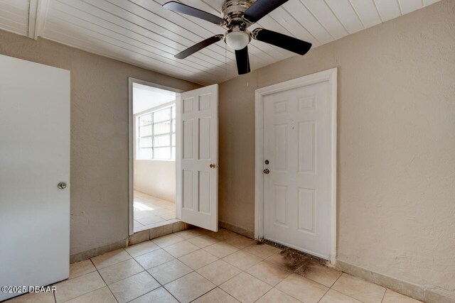 634 Aberdeen St, Daytona Beach, FL 32114 - foyer with a ceiling fan, light tile patterned floors, and a textured wall
