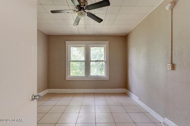 634 Aberdeen St, Daytona Beach, FL 32114 - unfurnished room with ceiling fan, light tile patterned flooring, and baseboards