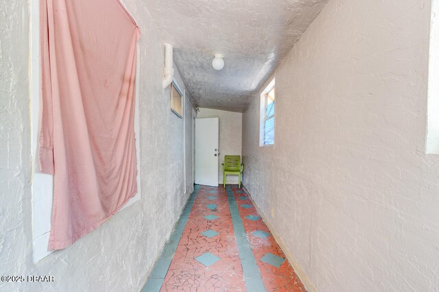 634 Aberdeen St, Daytona Beach, FL 32114 - hall featuring a textured wall