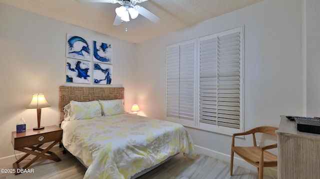 2403 S Atlantic Ave Unit 605, Daytona Beach, FL 32118 - bedroom with baseboards and wood finished floors