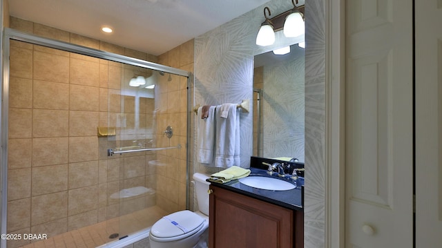 2403 S Atlantic Ave Unit 605, Daytona Beach, FL 32118 - full bathroom with toilet, vanity, and a stall shower