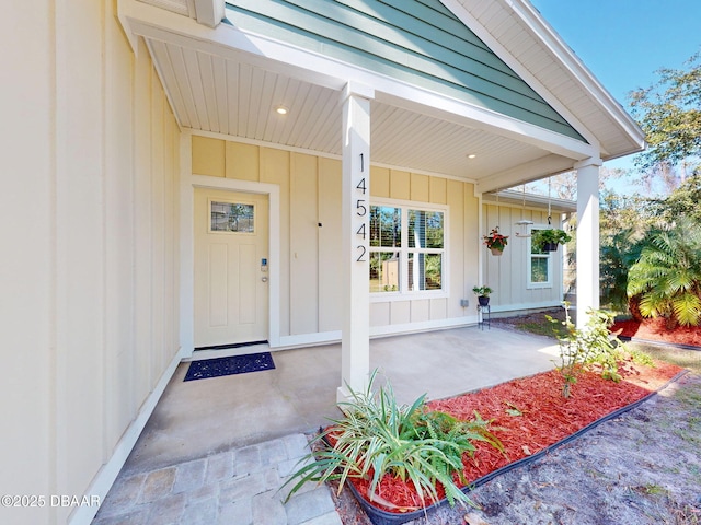 doorway to property featuring a porch