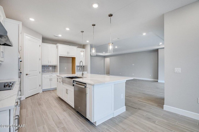 kitchen with a kitchen island with sink, sink, white cabinetry, and dishwasher