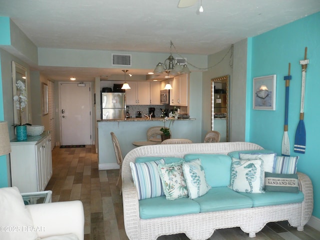 2615 S Atlantic Ave Unit 6E, Daytona Beach Shores, FL 32118 - living area featuring wood finished floors