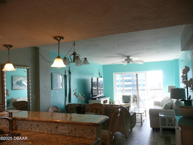 2615 S Atlantic Ave Unit 6E, Daytona Beach Shores, FL 32118 - dining room featuring light wood-type flooring and ceiling fan