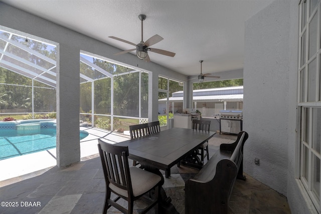 760 Trophy Hunter Trl, New Smyrna Beach, FL 32168 - exterior space featuring outdoor dining space, a ceiling fan, an outdoor pool, and grilling area