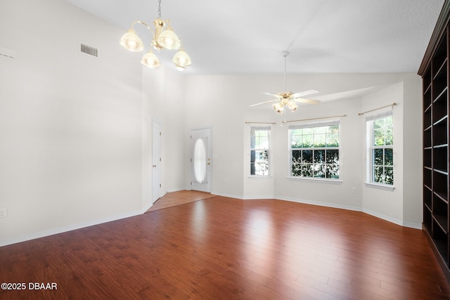 foyer entrance with ceiling fan with notable chandelier, wood finished floors, visible vents, and baseboards