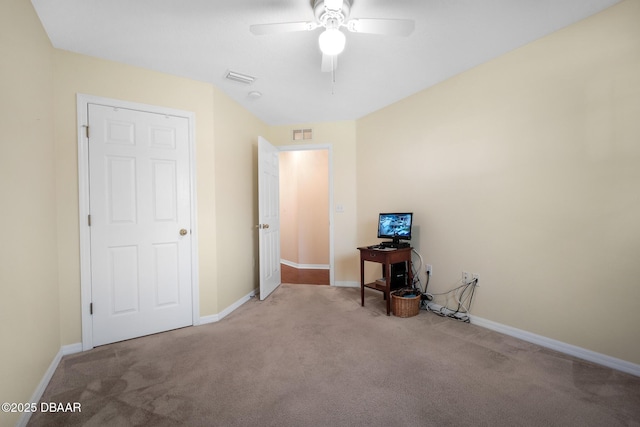 interior space with a ceiling fan, carpet, visible vents, and baseboards