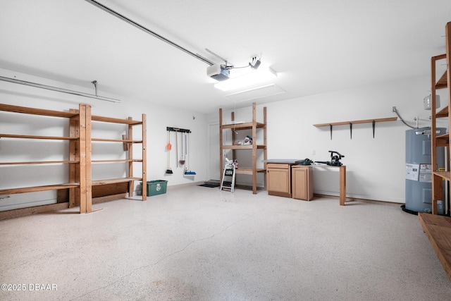 garage featuring a garage door opener and electric water heater