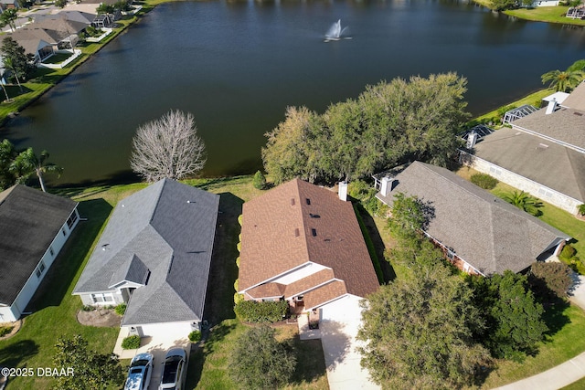 aerial view with a water view and a residential view