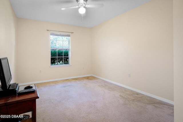 interior space with ceiling fan and baseboards