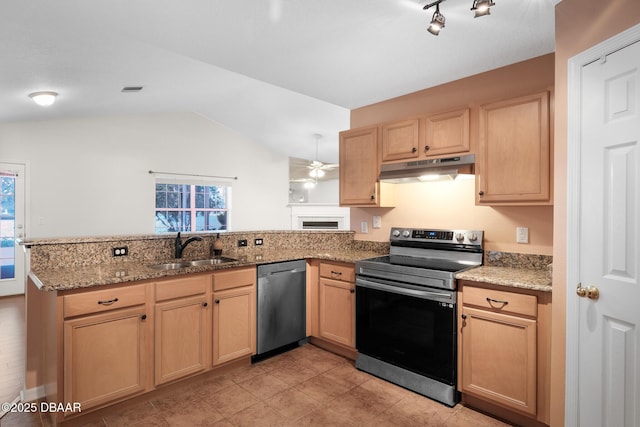 kitchen with under cabinet range hood, stainless steel appliances, a peninsula, a sink, and light brown cabinetry