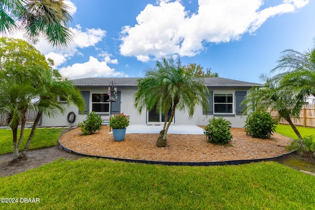 ranch-style house with a front yard