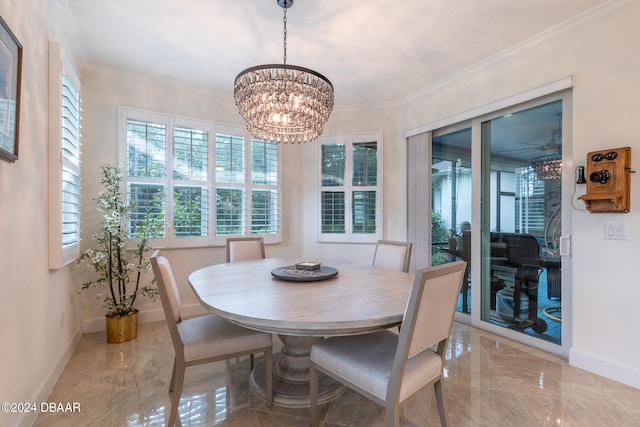 dining area with a notable chandelier and crown molding