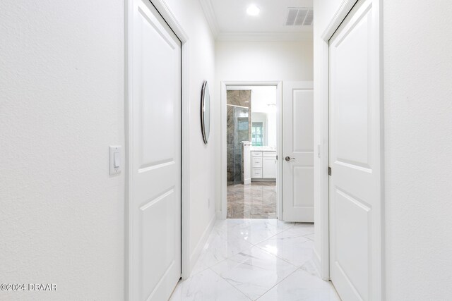 1124 Sea Shell Ct, Daytona Beach, FL 32124 - hallway with ornamental molding, light marble finish flooring, recessed lighting, and baseboards