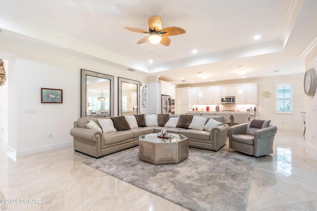 1124 Sea Shell Ct, Daytona Beach, FL 32124 - living area with a tray ceiling, light marble finish flooring, ornamental molding, baseboards, and recessed lighting