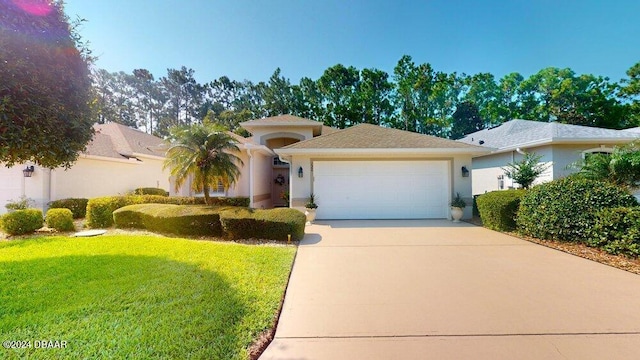 view of front facade featuring a garage and a front yard