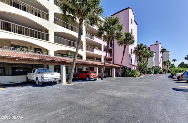 731 Marina Point Dr Unit 7310, Daytona Beach, FL 32114 - view of apartment building / complex with covered parking