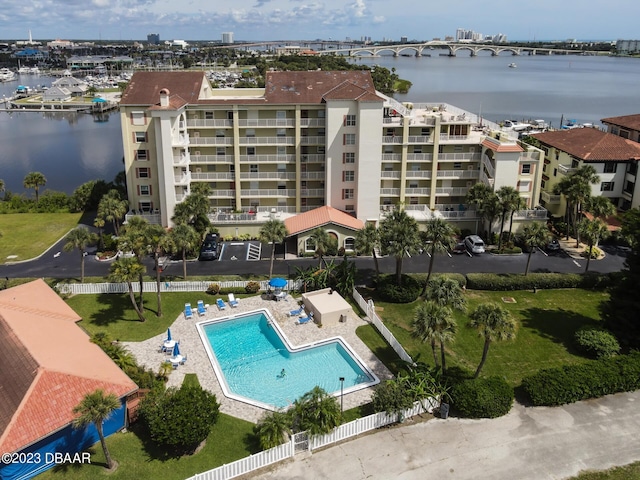 birds eye view of property featuring a water view