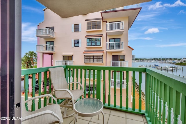 balcony featuring a water view