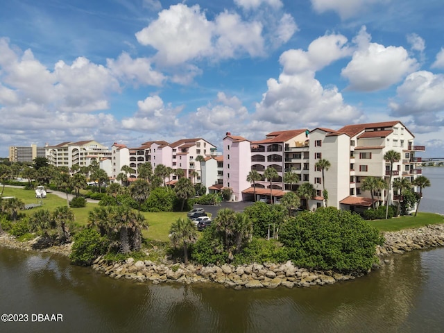 view of building exterior featuring a water view