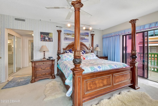 bedroom with access to exterior, light carpet, and ceiling fan