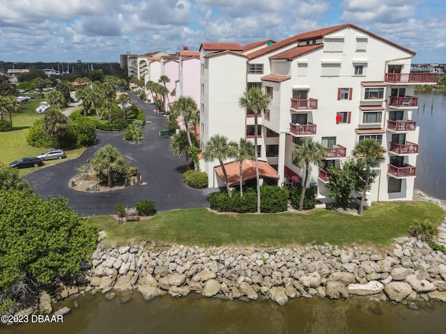 view of building exterior with a water view