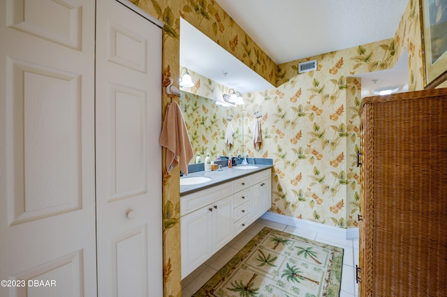 bathroom with vanity and tile patterned floors