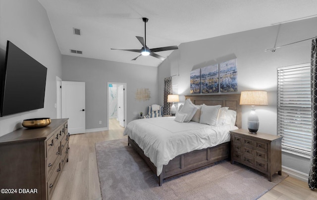 4791 S Peninsula Dr, Ponce Inlet, FL 32127 - bedroom featuring high vaulted ceiling, baseboards, light wood-style flooring, and visible vents