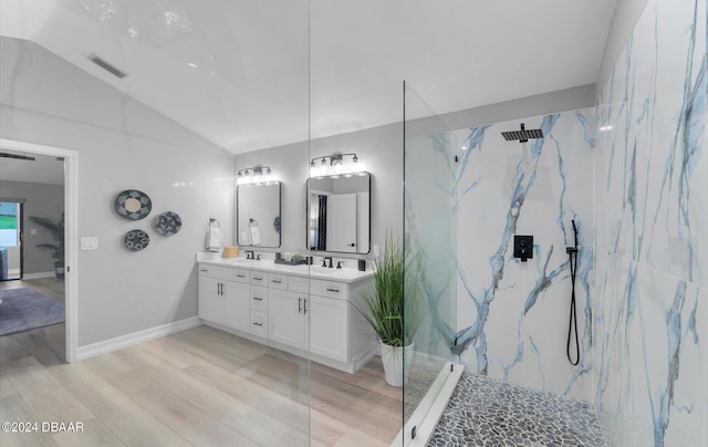 4791 S Peninsula Dr, Ponce Inlet, FL 32127 - bathroom with visible vents, a marble finish shower, wood finished floors, and lofted ceiling