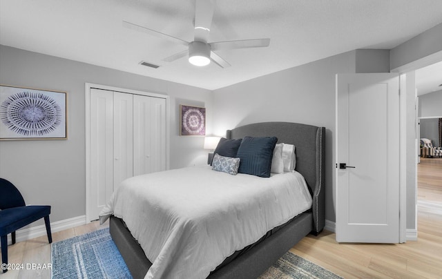 4791 S Peninsula Dr, Ponce Inlet, FL 32127 - bedroom featuring baseboards, a closet, light wood-type flooring, and visible vents