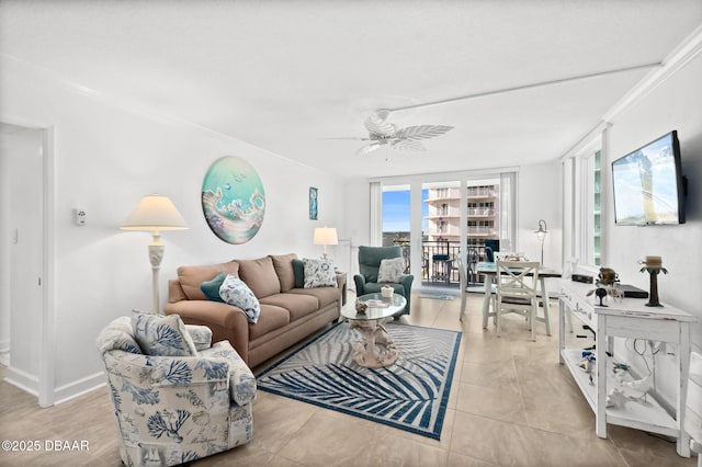 tiled living room featuring ceiling fan