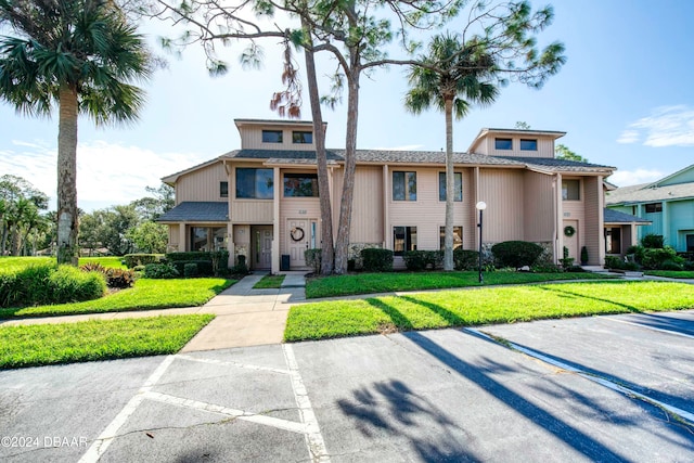 view of front of home with a front yard