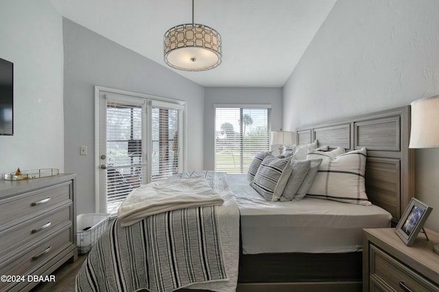 bedroom featuring dark hardwood / wood-style floors and vaulted ceiling