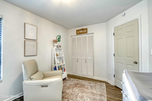 sitting room featuring hardwood / wood-style flooring