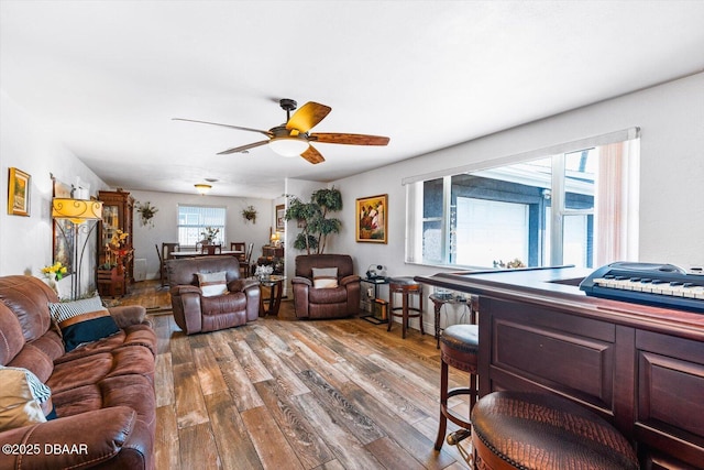 153 University Cir, Ormond Beach, FL 32176 - living area featuring wood finished floors and a ceiling fan