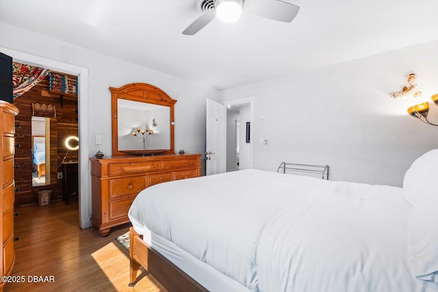 153 University Cir, Ormond Beach, FL 32176 - bedroom featuring light wood-style flooring and ceiling fan