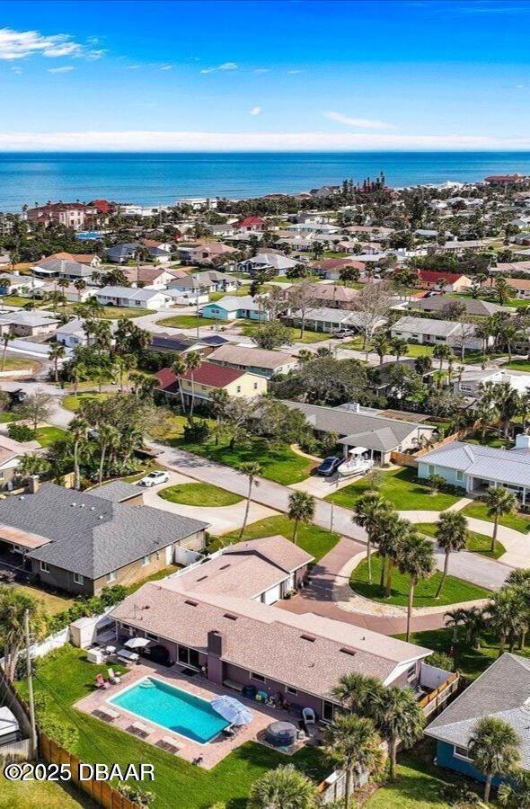 153 University Cir, Ormond Beach, FL 32176 - aerial view of residential area featuring a large body of water and a pool