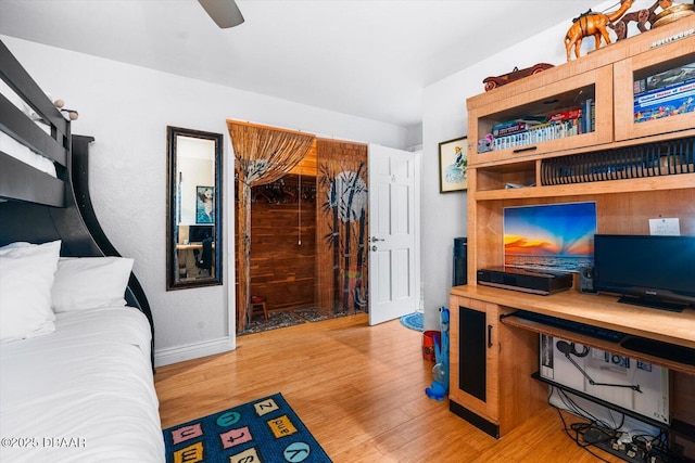 153 University Cir, Ormond Beach, FL 32176 - bedroom with light wood-style floors and ceiling fan