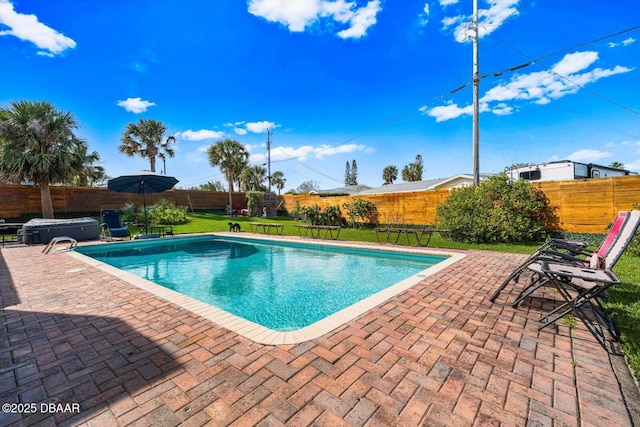 153 University Cir, Ormond Beach, FL 32176 - view of swimming pool with a fenced backyard, a patio, and a covered hot tub