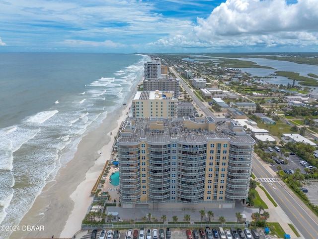 bird's eye view with a beach view and a water view