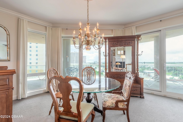 carpeted dining space with ornamental molding and a chandelier