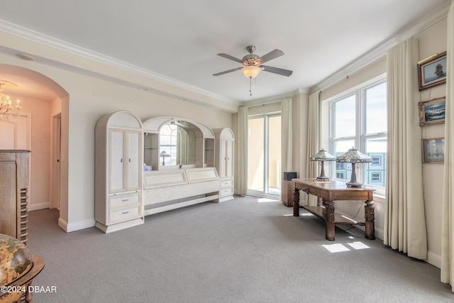 interior space featuring ceiling fan with notable chandelier and crown molding