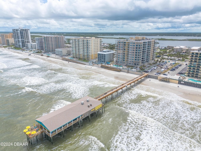 bird's eye view with a beach view and a water view