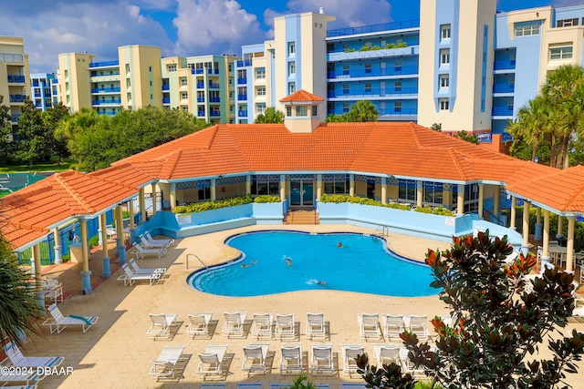 view of swimming pool featuring a patio area